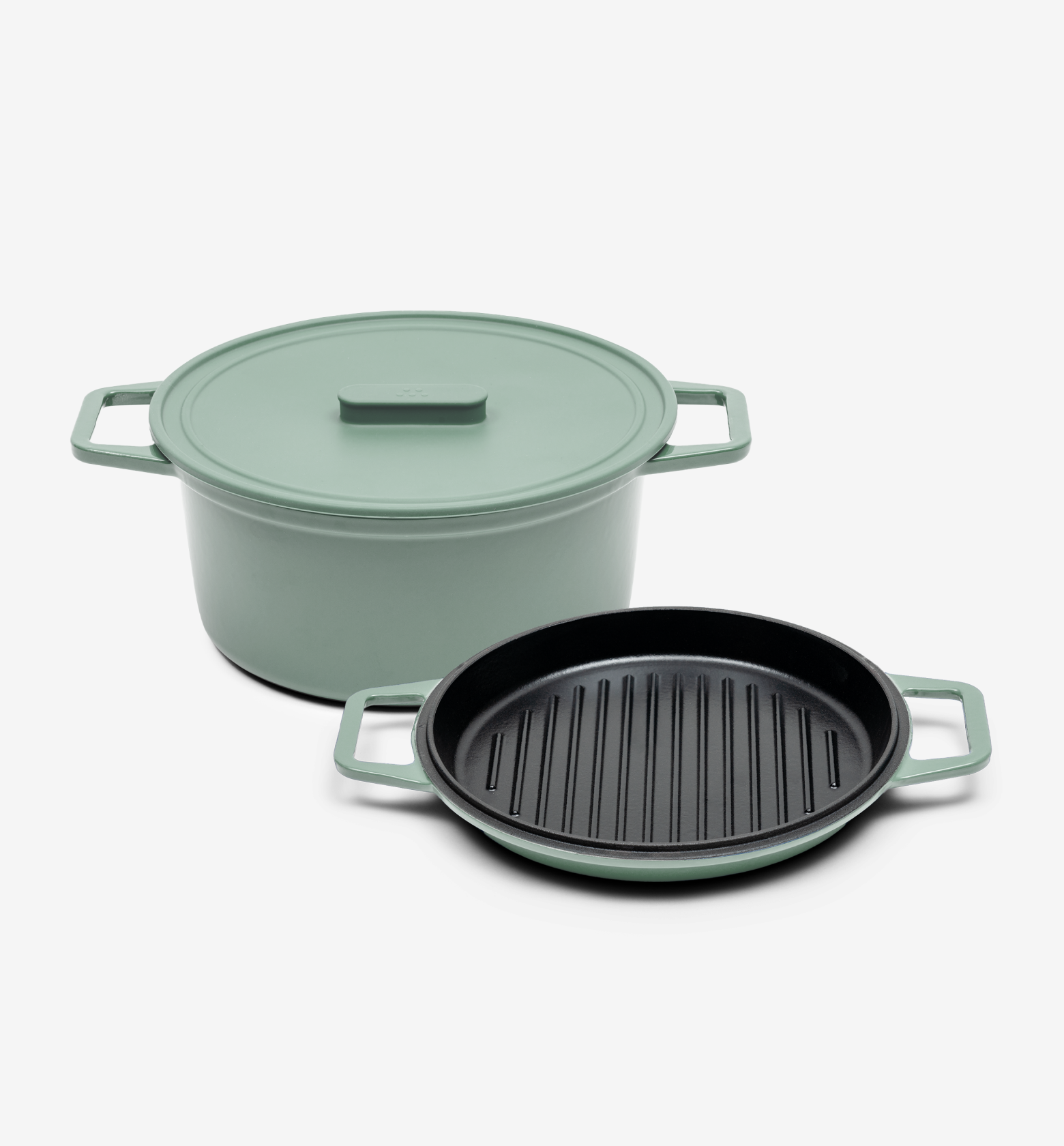 Sage green cast iron Dutch oven with lid and matching grill pan set